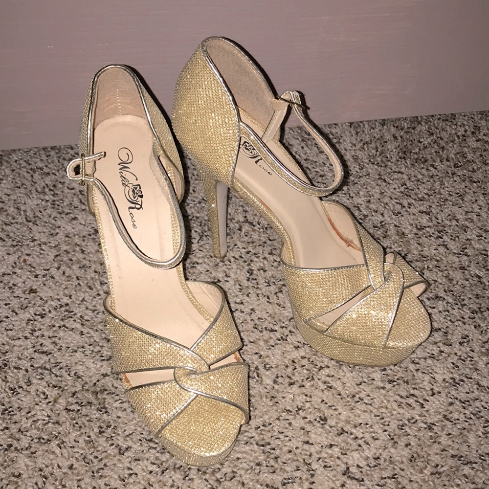 Metallic gold 5.5 inch open toe heels with platform. Size 9.